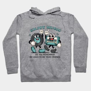 Enjoy the Music. Retro mascots of vinyl records and cassettes that dance to music Hoodie